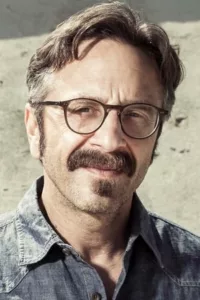 Marc Maron (born September 27, 1963) is an American stand-up comedian and podcast host. He has been host of The Marc Maron Show, and co-host of both Morning Sedition, and Breakroom Live, all politically-oriented shows, produced under the auspices of […]
