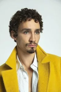 Robert Sheehan (born 7 January 1988) is an Irish actor. Sheehan is known for playing Klaus Hargreeves on Netflix’s original series The Umbrella Academy. He is the son of Joe and Maria Sheehan. His father was a member of the […]