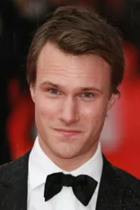 Hugh Skinner (born January 6, 1985) is an English actor best known for playing Joly in the 2012 film Les Miserables, Will Humphries in W1A (2017), Wills in The Windsors (2019), Harry in Fleabag (2016), Unwin Trevaunance in series 2 […]