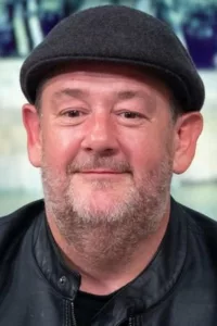 Johnny Vegas is the stage name of Michael Pennington, the St Helens born actor, stand up comedian, writer and director. He is perhaps best known for his lead role as Moz in the BBC3 sitcom Ideal and for his role […]