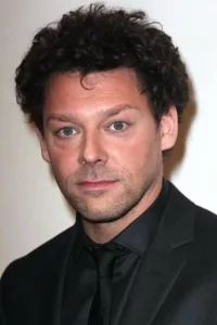 From Wikipedia, the free encyclopedia Richard Coyle (born 27 February 1972) is an English actor. He portrayed lead role of Father Faustus Blackwood in Netflix series Chilling Adventures of Sabrina, and Jeff Murdock in the sitcom Coupling. Description above from […]