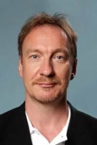 David Wheeler (born 20 March 1963), better known as David Thewlis, is an English actor and filmmaker. He is known as a character actor and has appeared in a wide variety of genres in both film and television. He has […]